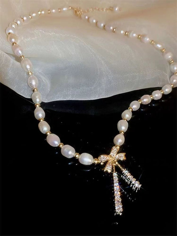 KISALL Natural Freshwater Pearl Studded Diamond Bow Tassel Necklace